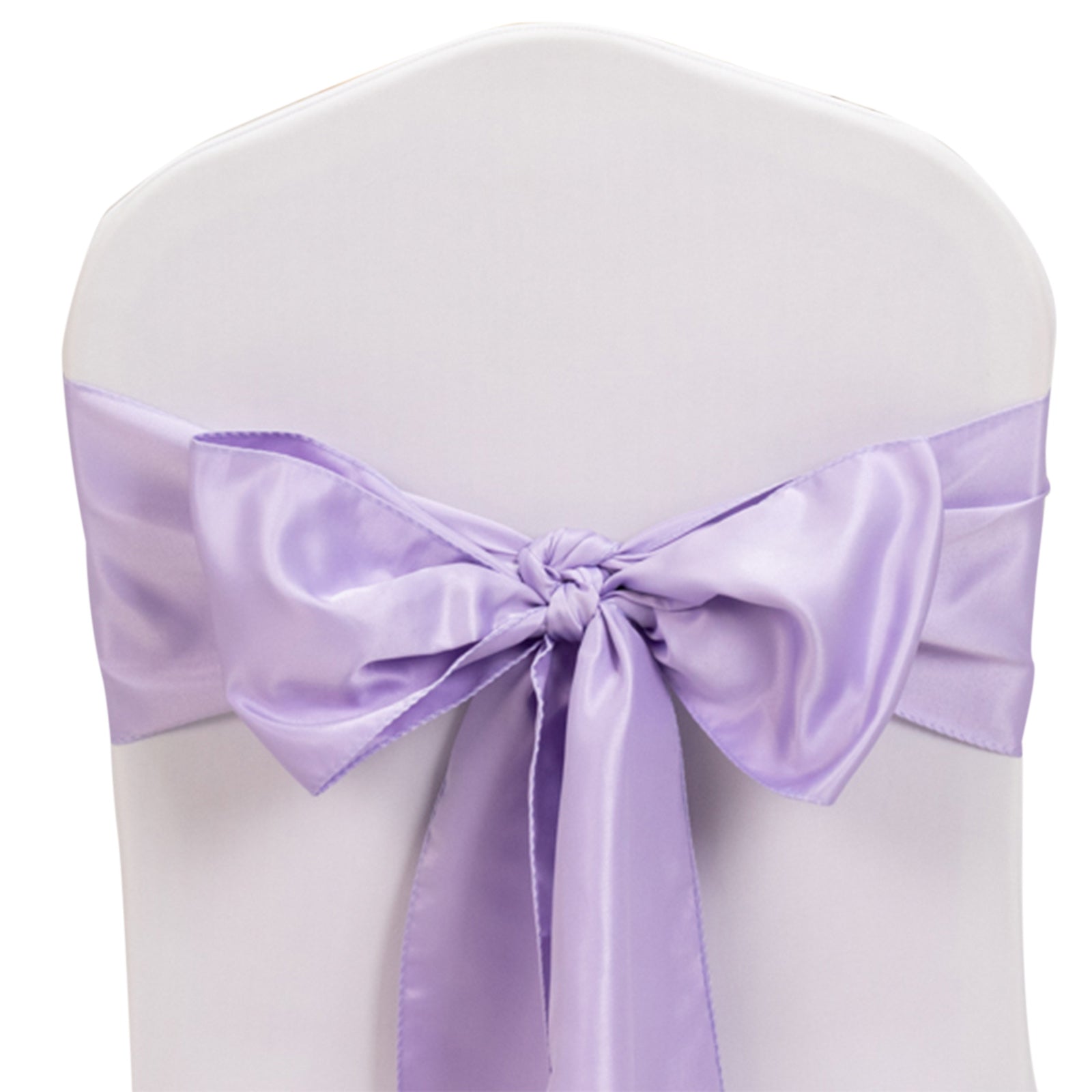 Lavender satin chair sash bow on a white chair cover.