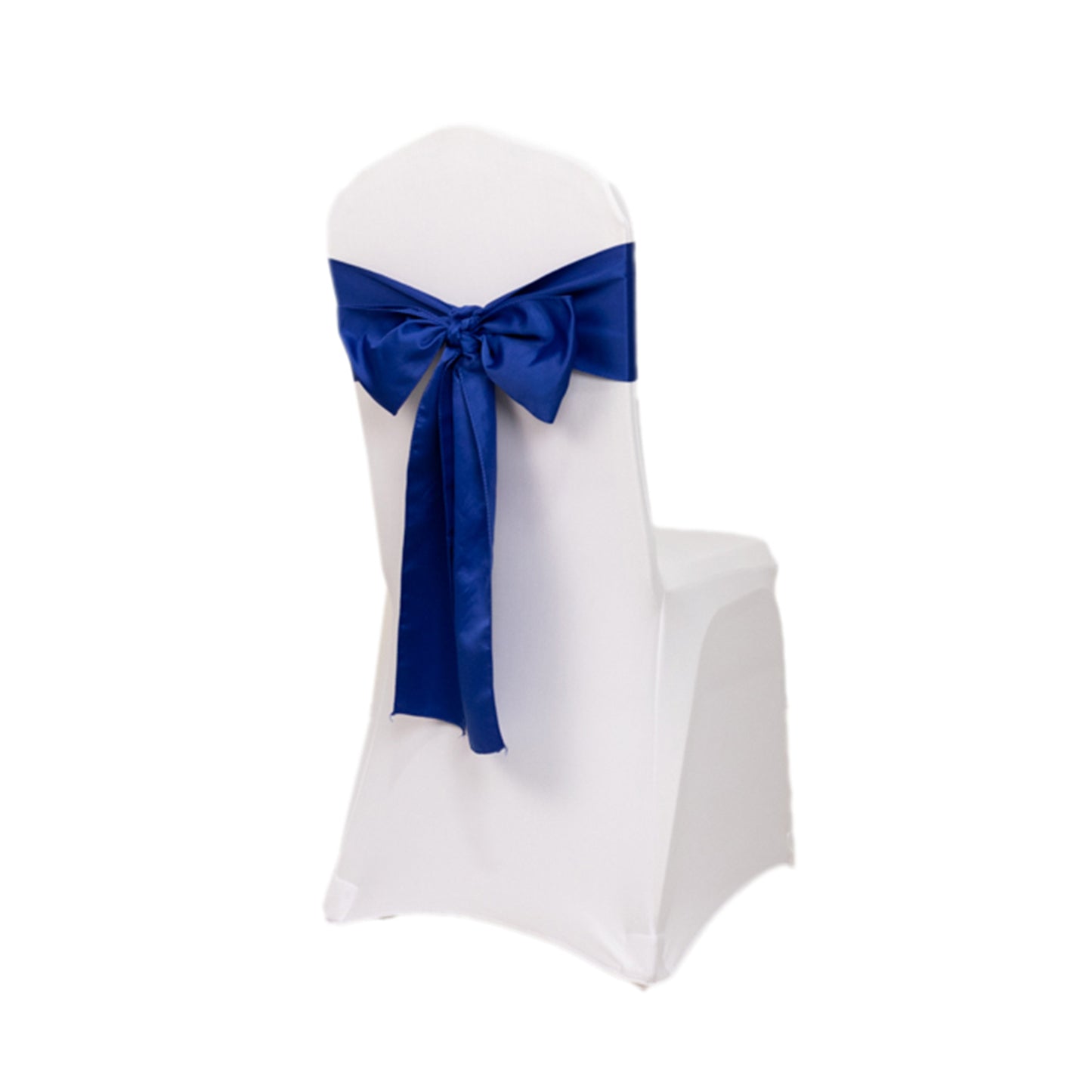 Royal blue satin chair sash and bow on a white chair.