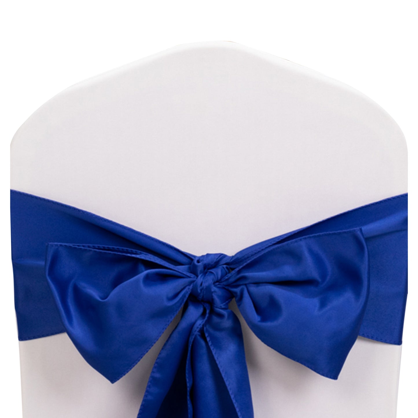 Royal blue satin chair sash bow on a white chair.