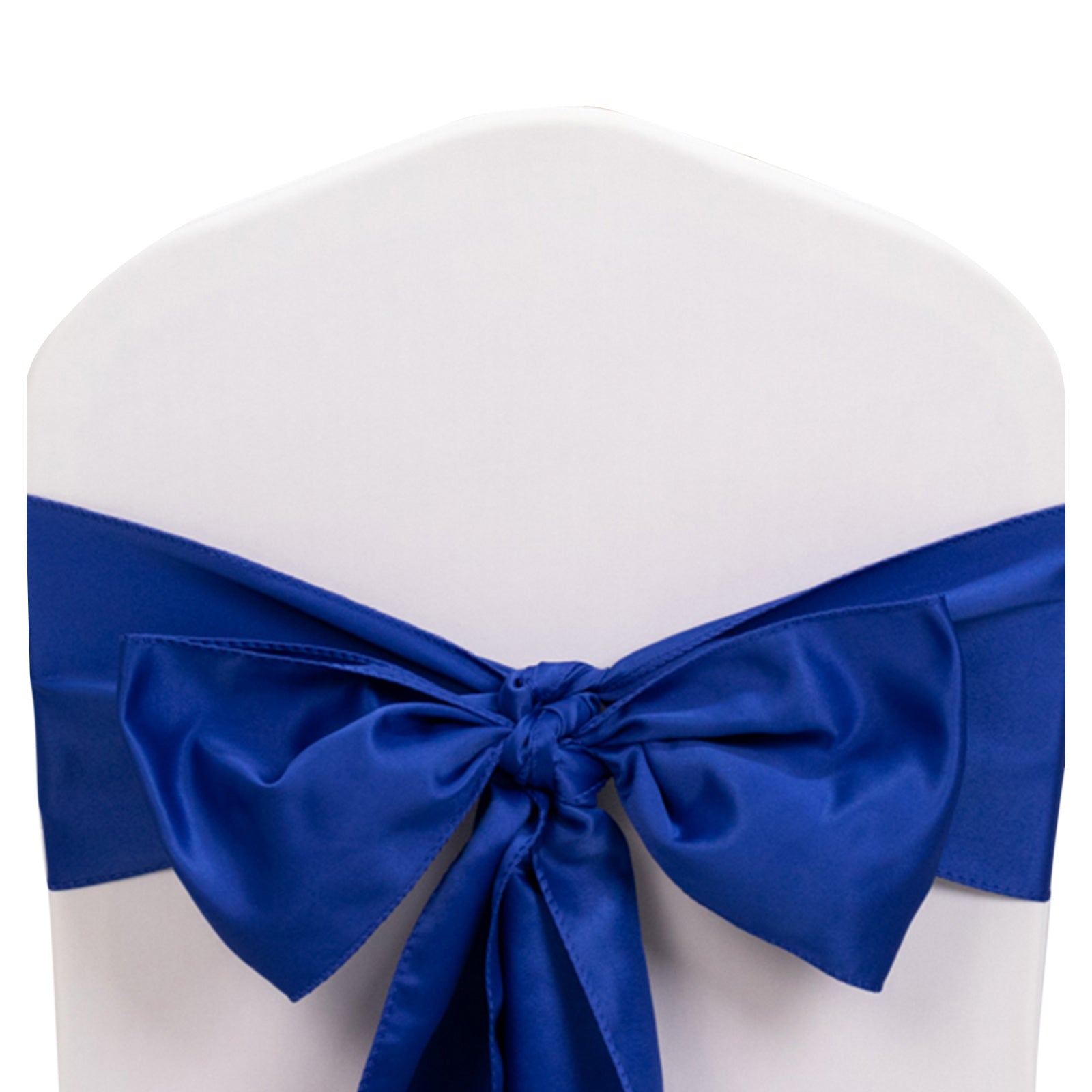 Royal blue satin chair sash bow on a white chair.