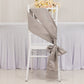 Silver satin chair sash elegantly tied on a white chair.