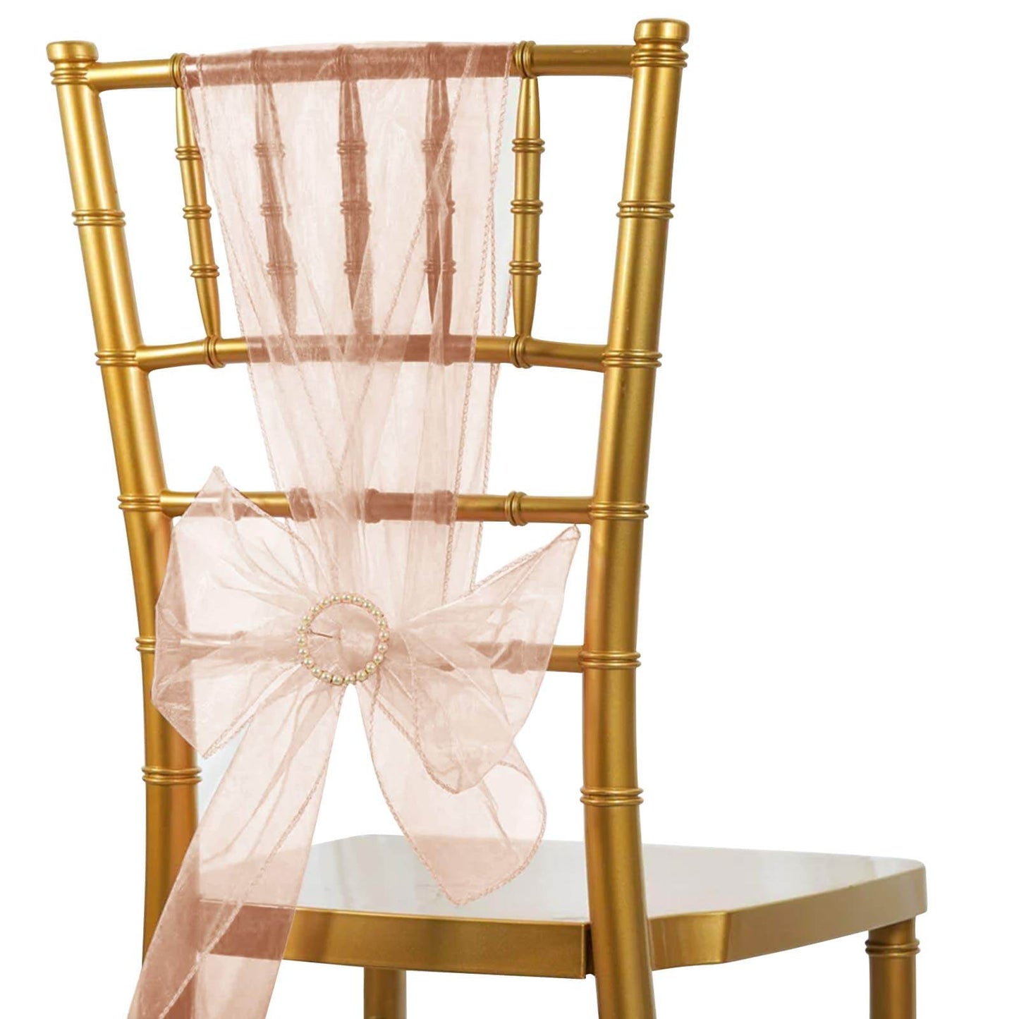 Dusty rose organza chair sash tied on a gold chiavari chair.