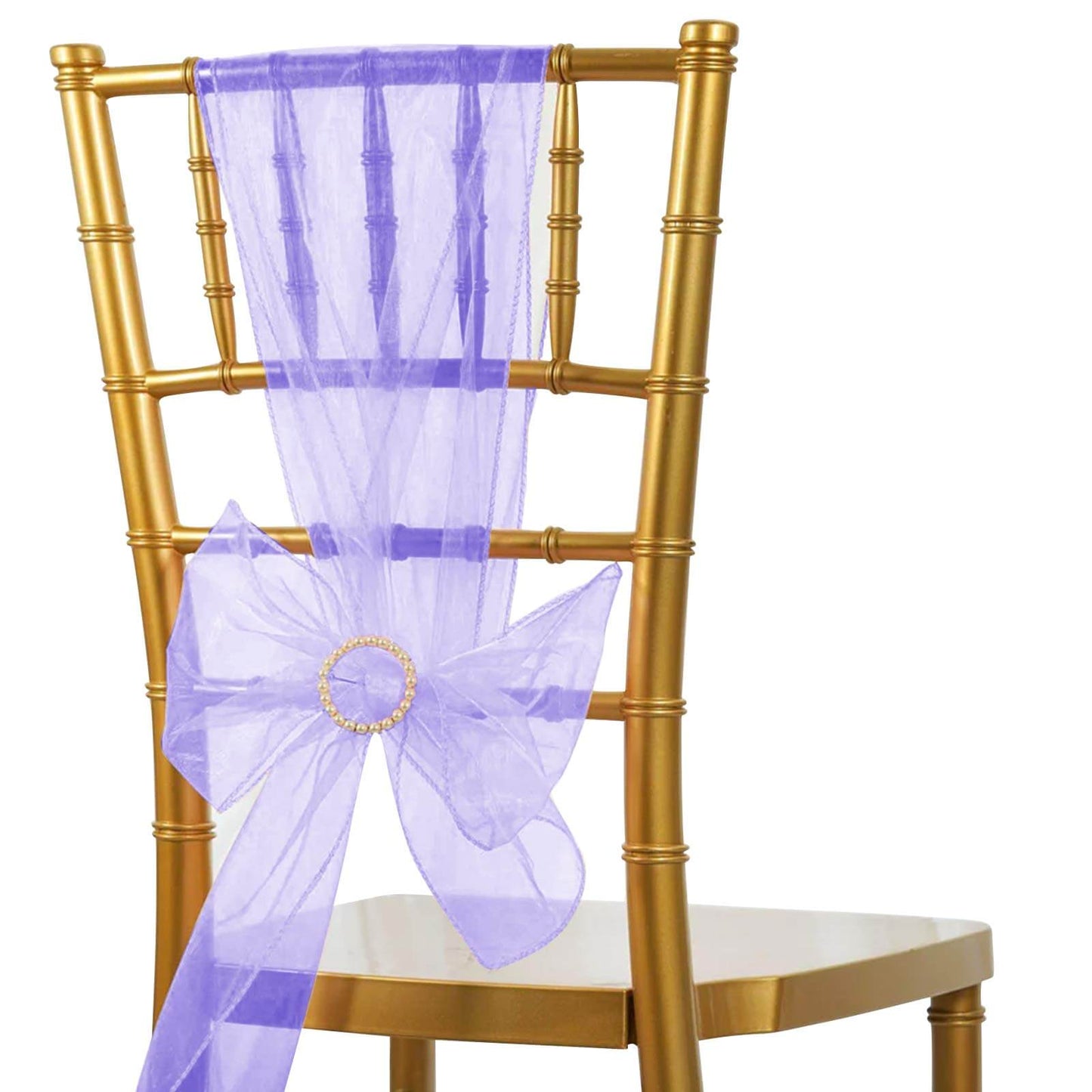 Purple organza chair sash on a gold chair, perfect for weddings.