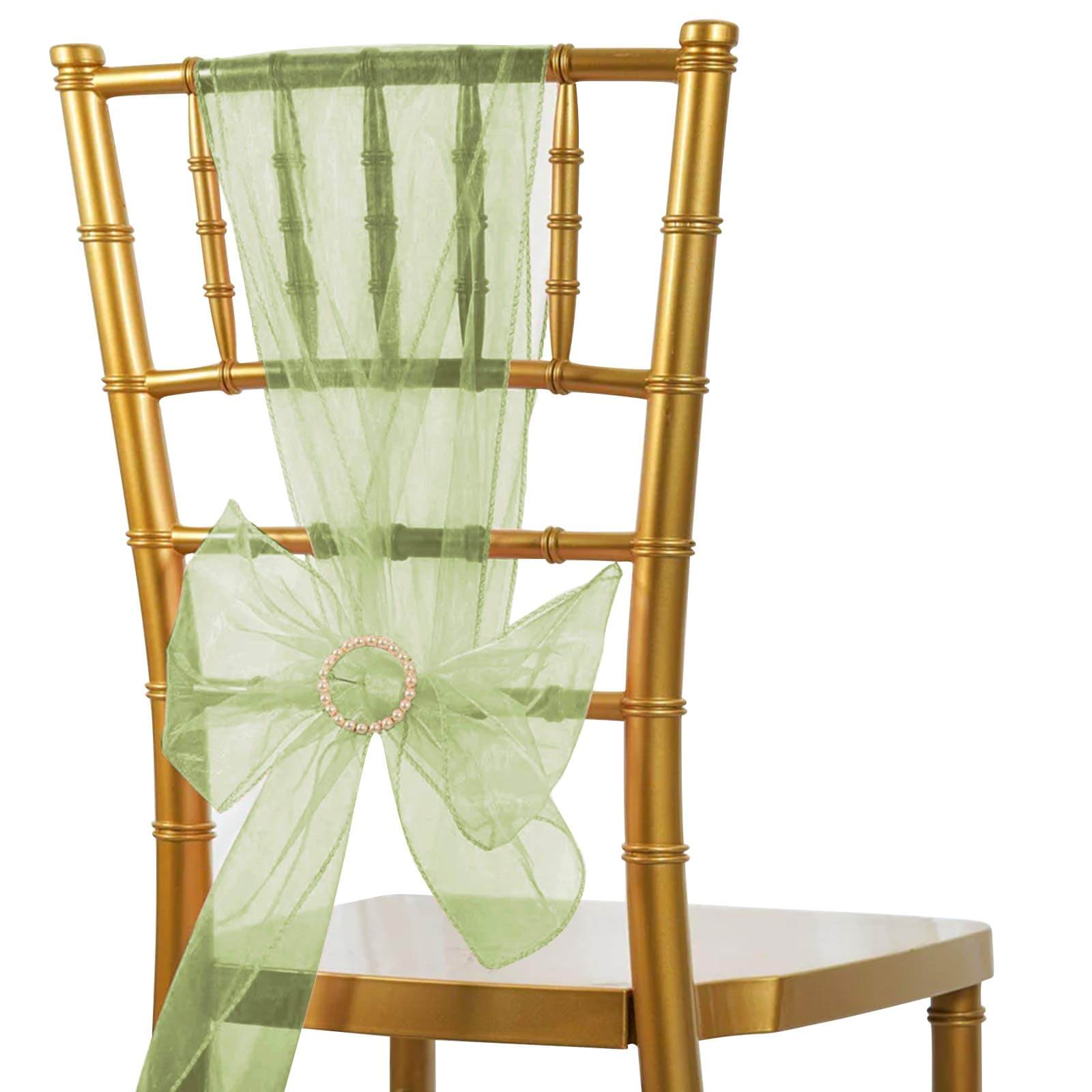 Olive green organza chair sash tied in a bow on a gold chair.