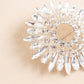 Silver snowflake chair sash band buckle with diamonds and rhinestones.