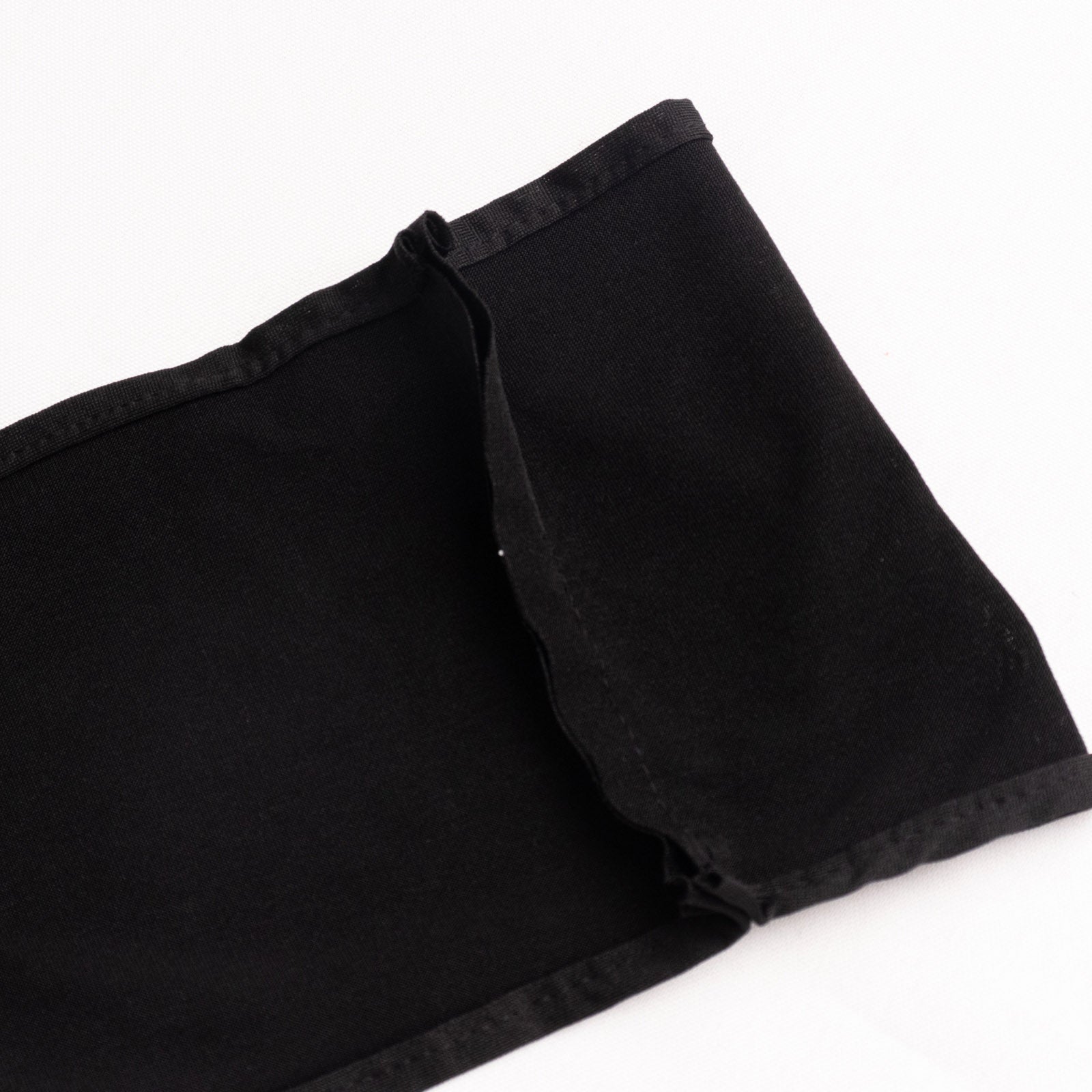 Black spandex chair sash with gold diamond buckle detail.