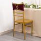 Burgundy spandex chair sash with gold diamond buckle on a gold chair.