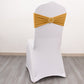 Gold spandex chair sash with diamond buckle on a white chair.