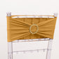 Gold spandex chair sash with diamond buckle on a clear chiavari chair.