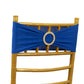 Royal blue spandex chair sash with gold diamond buckle on a chair. #whtbkgd
