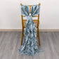 Dusty blue curly chiffon satin chair sash tied on a gold chair.