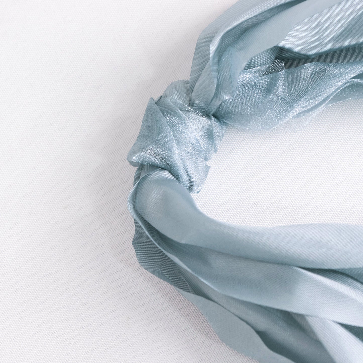 Dusty blue chiffon satin chair sashes in a 5 pack.