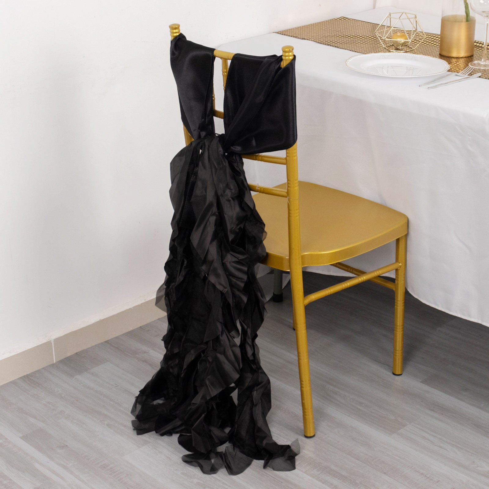 Black chiffon satin chair sash for elegant decor.
