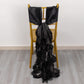 Black curly chiffon satin chair sashes on a gold chair.