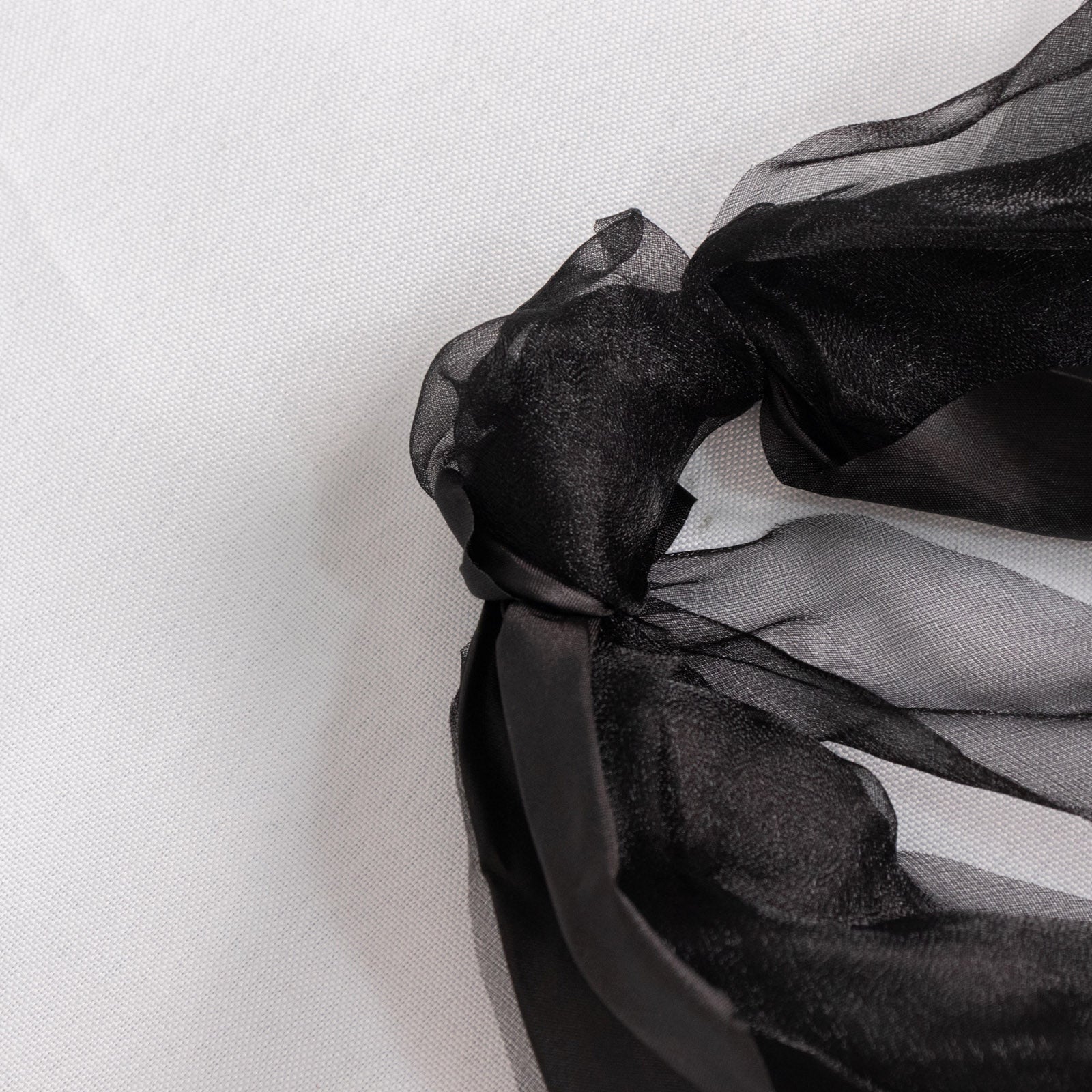 Black chiffon satin chair sashes in a 5 pack.