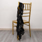 Black curly willow chiffon satin chair sash draped on a gold chair.