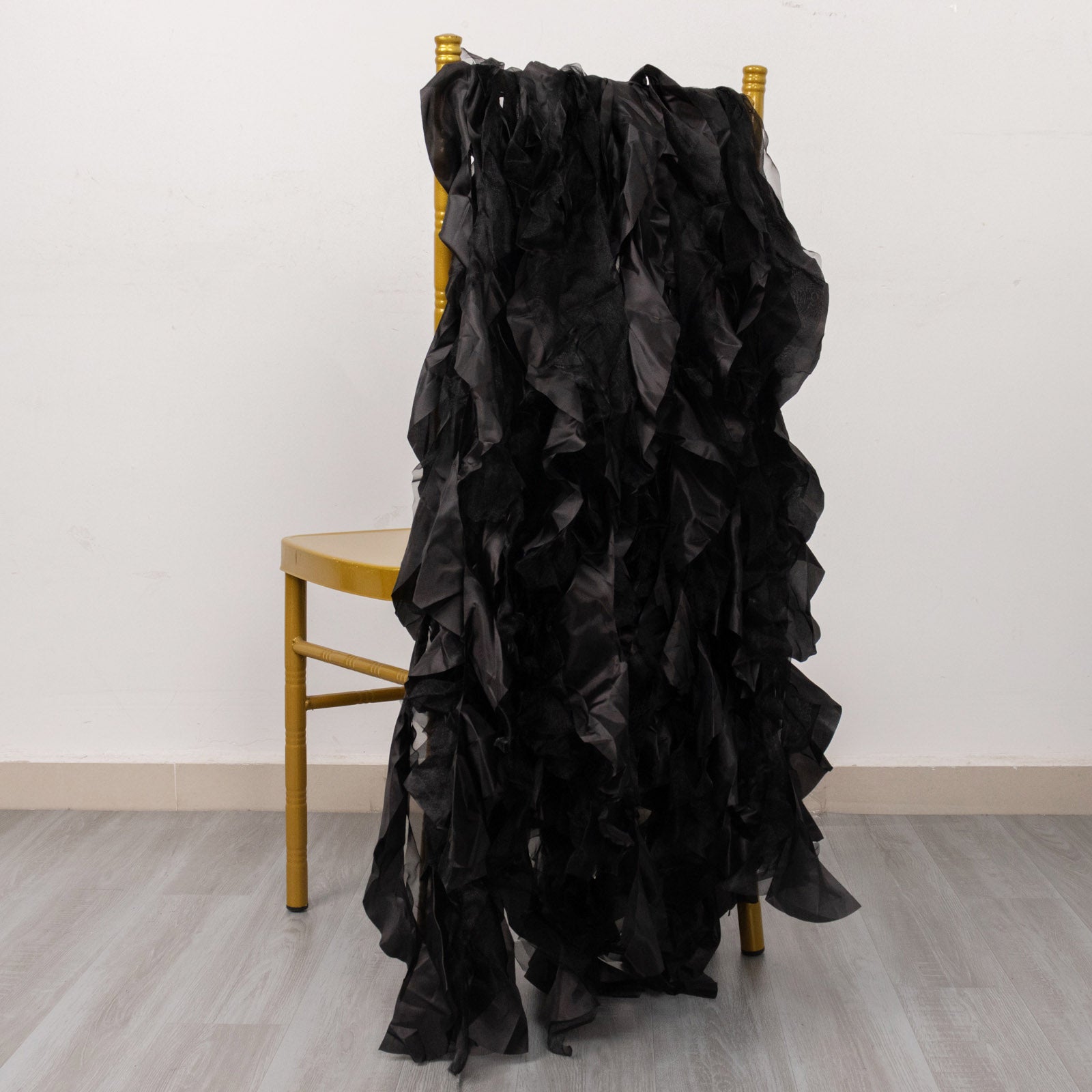 Black Curly Willow Chiffon Satin Chair Sashes on a chair