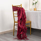 Burgundy chiffon satin chair sash draped on a gold chair.