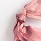 Cinnamon rose chiffon satin chair sashes in a 5 pack.
