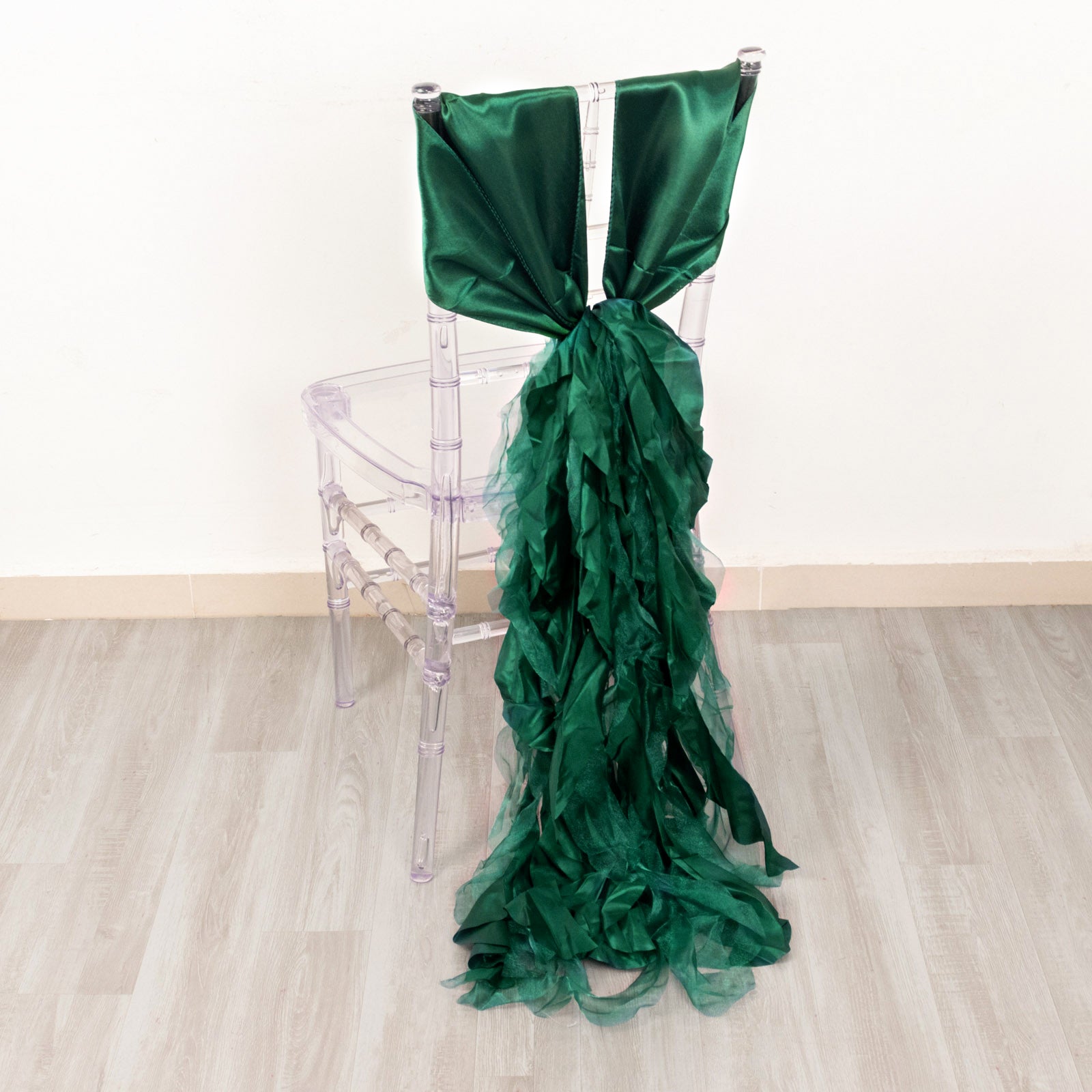 Emerald green curly chiffon satin chair sash for elegant decor.