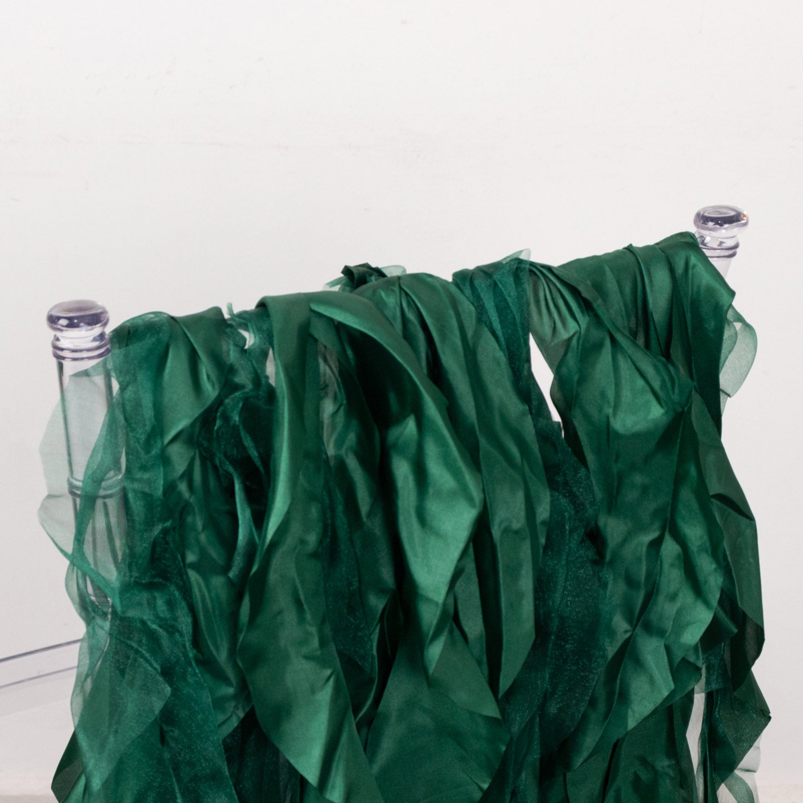 Emerald green chiffon satin chair sashes in a 5-pack.