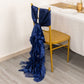 Navy blue curly chiffon satin chair sash draped on a gold chair.