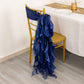 Navy blue curly chiffon satin chair sash draped on a gold chair.