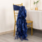 Navy blue curly chiffon satin chair sash draped on a gold chair.