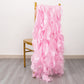 Pink chiffon satin chair sashes draped over a gold chair.