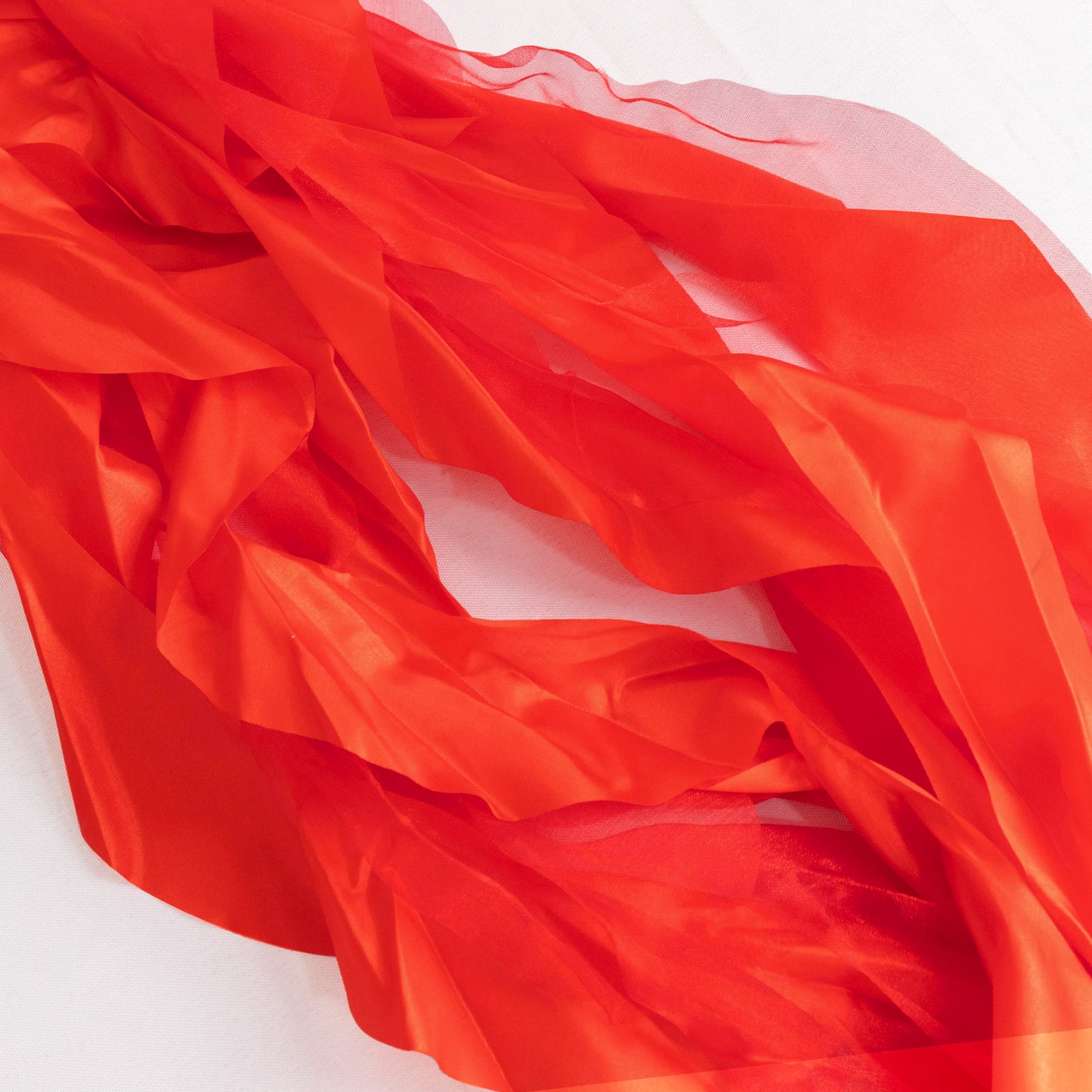 Red chiffon satin chair sashes, perfect for elegant events and decorations.
