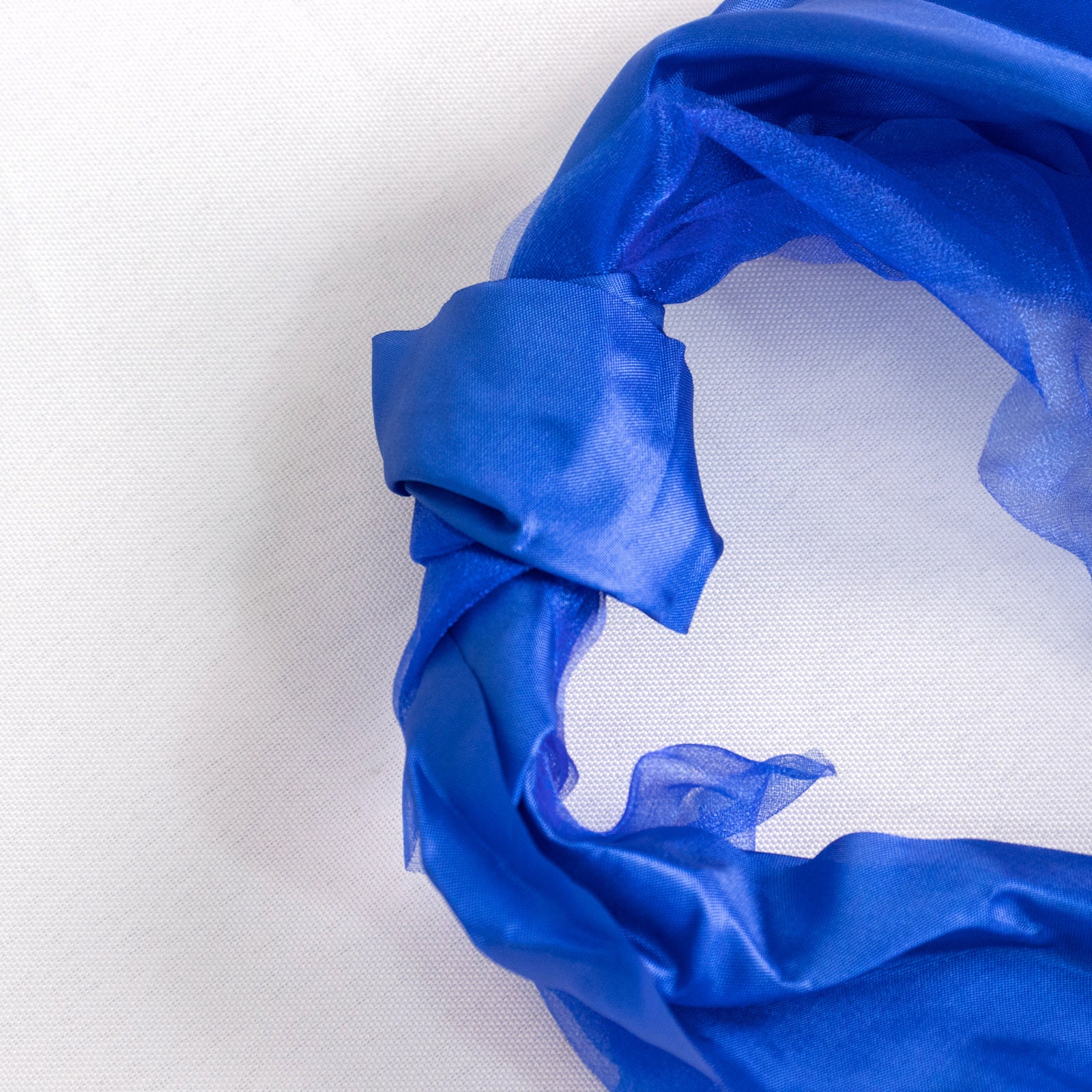 Royal blue chiffon satin chair sashes in a 5-pack.