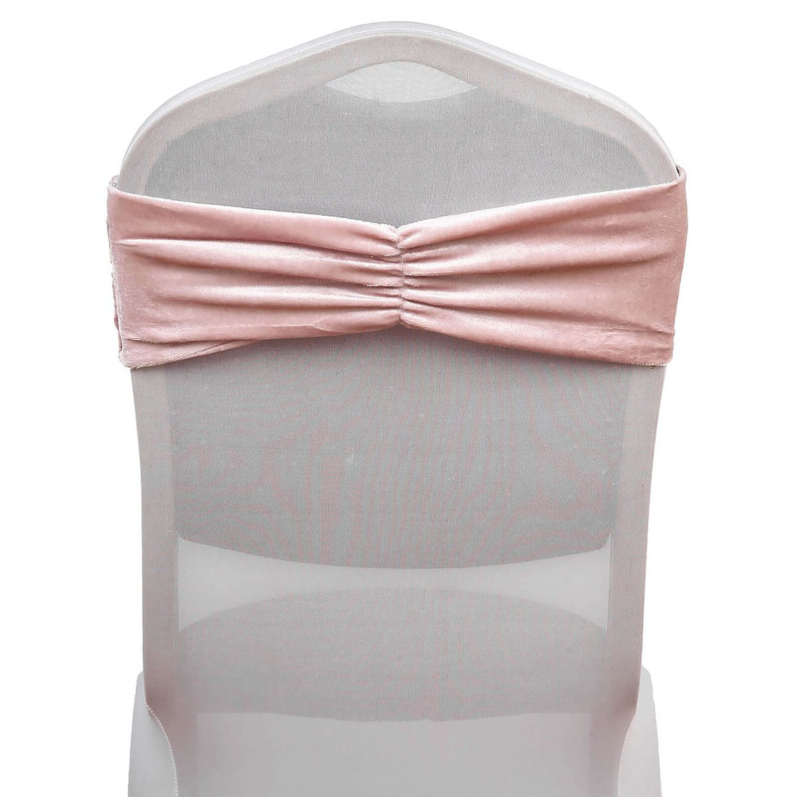 Blush velvet ruffle stretch chair sash on a transparent chair. #whtbkgd