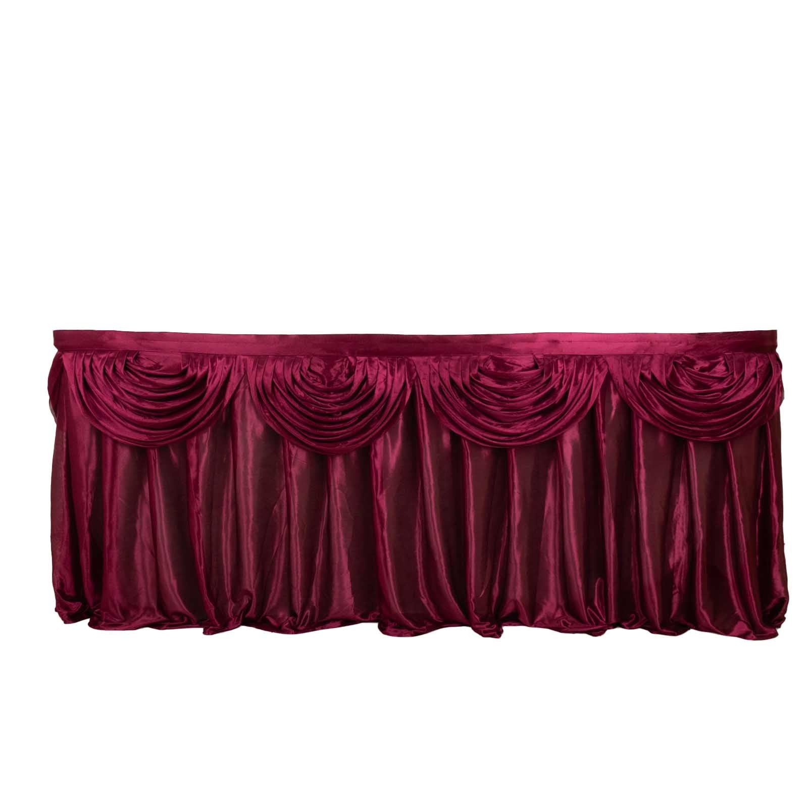 Burgundy pleated satin table skirt with draping detail.