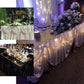 Ivory pleated satin double drape table skirt styled for elegant decor.