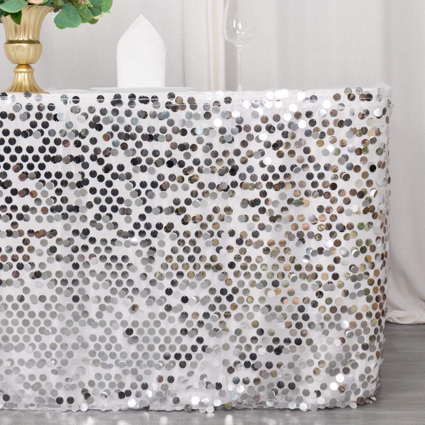 21ft silver sequin table skirt with dual layered satin finish.