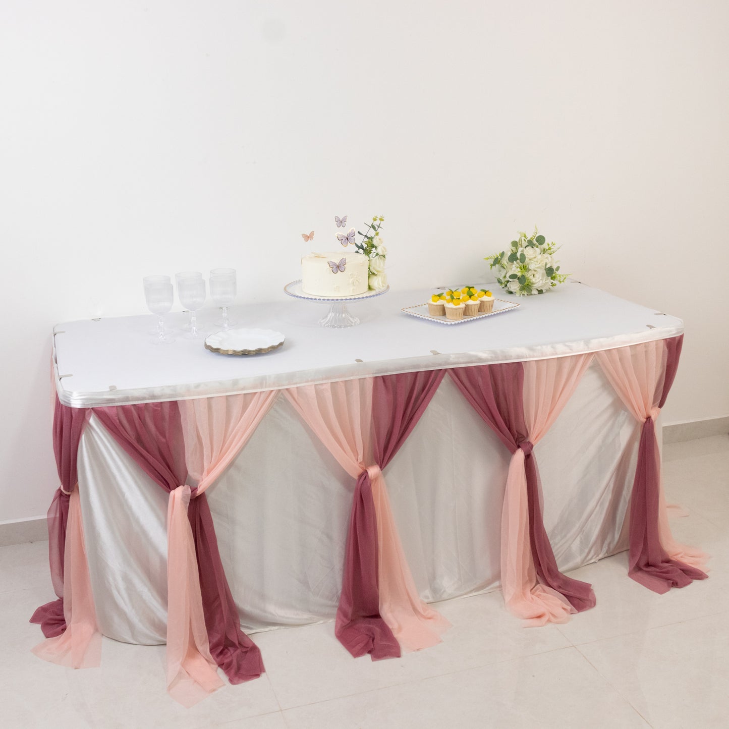 Blush table decor with elegant drapes