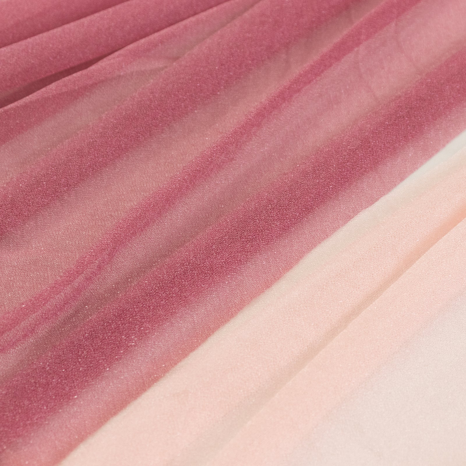 Blush fabric with a soft gradient texture