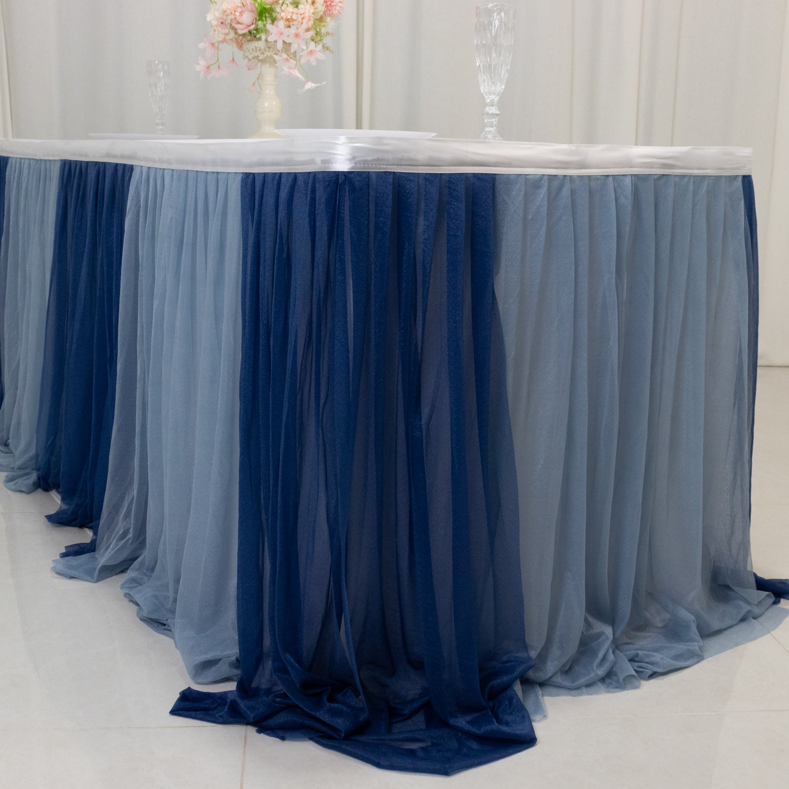 Navy blue and dusty blue sheer pleated ruffle table skirt.