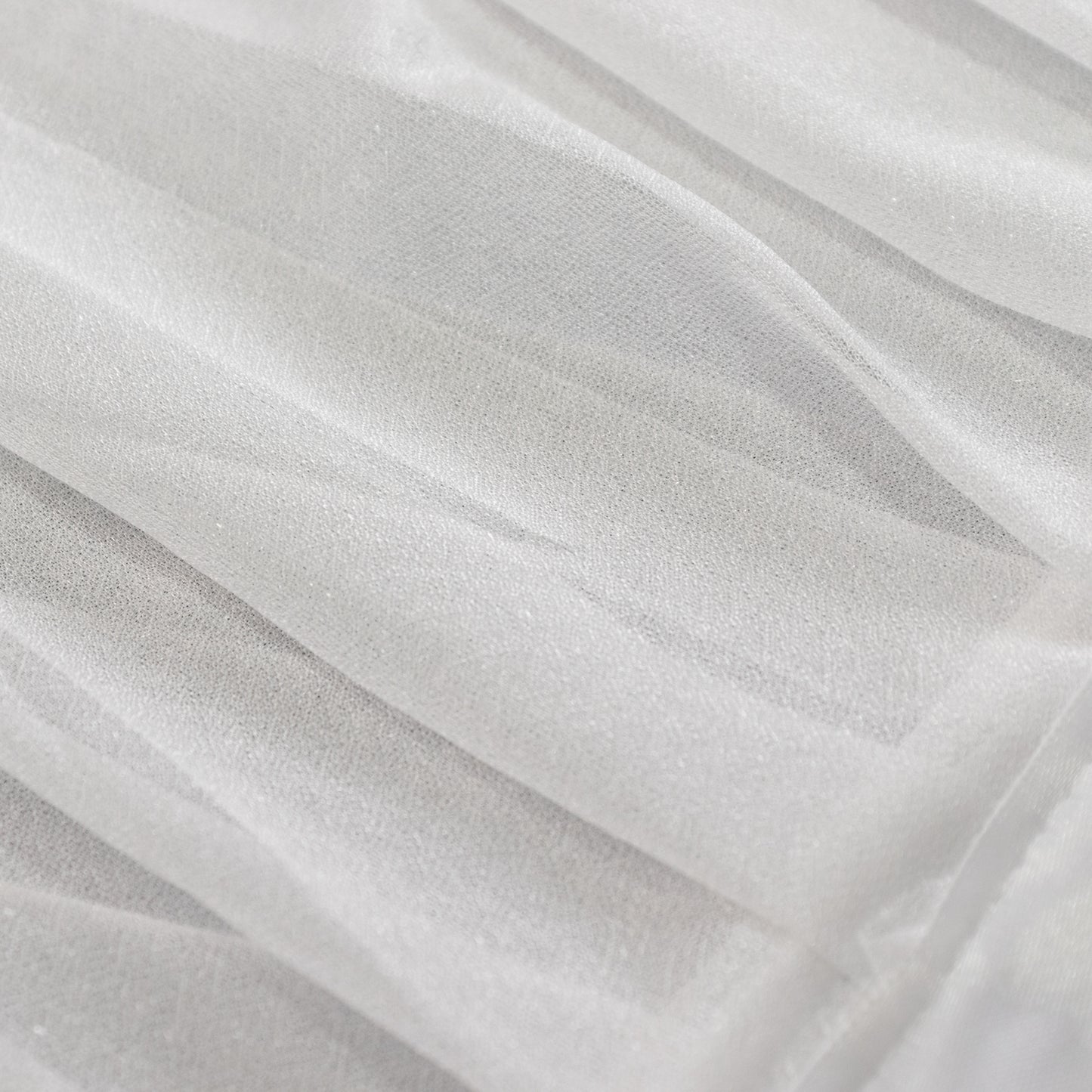 White sheer fabric with textured pleats