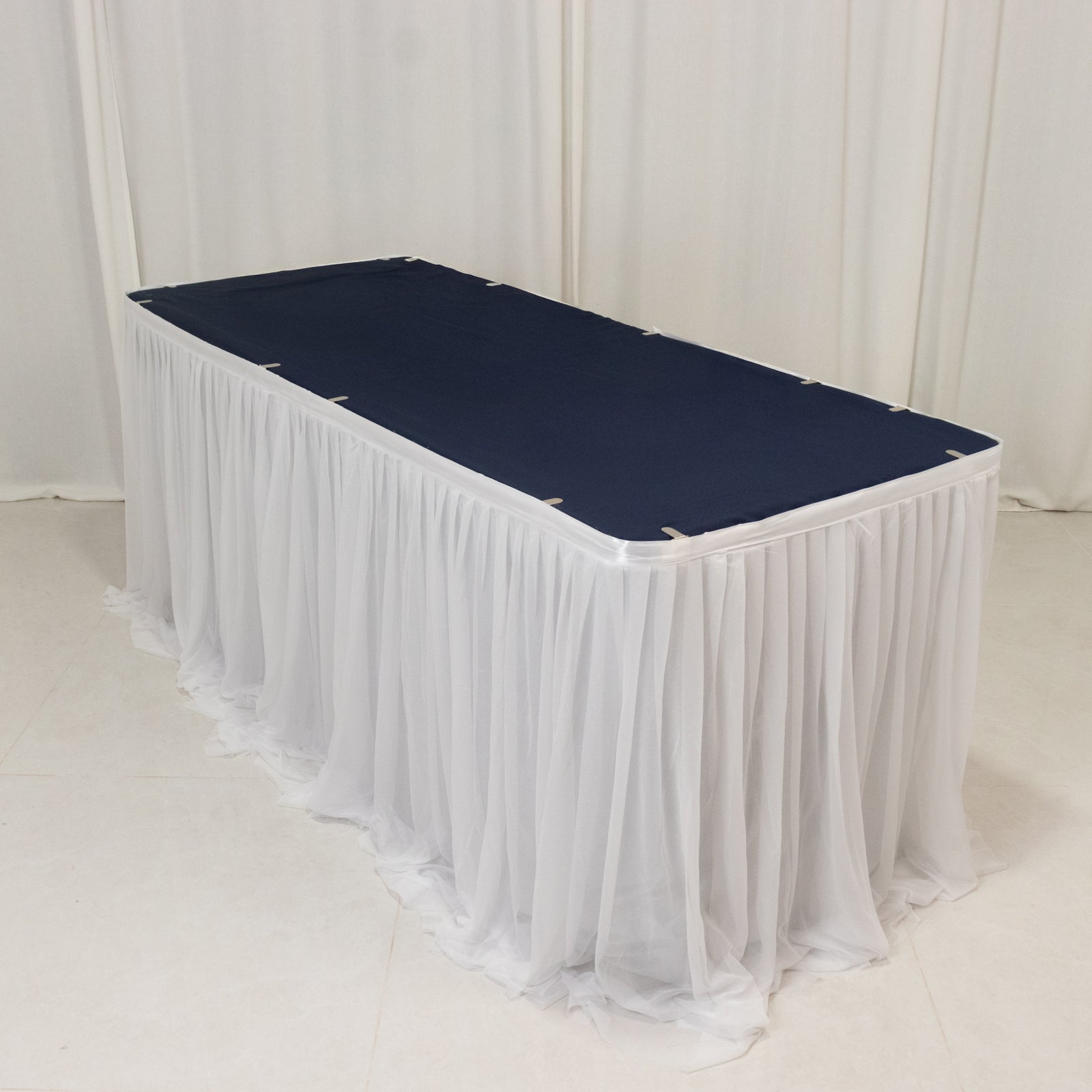 White table cover with navy blue top