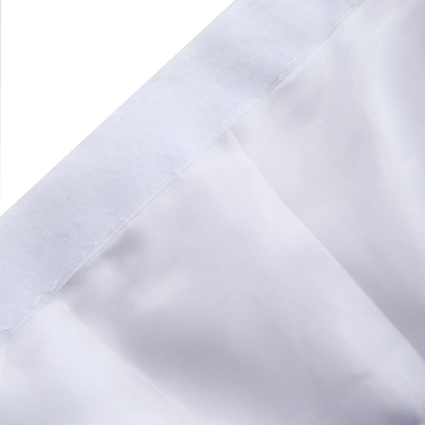 Close-up of white fabric with a smooth texture and clean edges.
