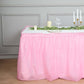 Pink ruffled table skirt for events, durable and disposable, 14ft long.