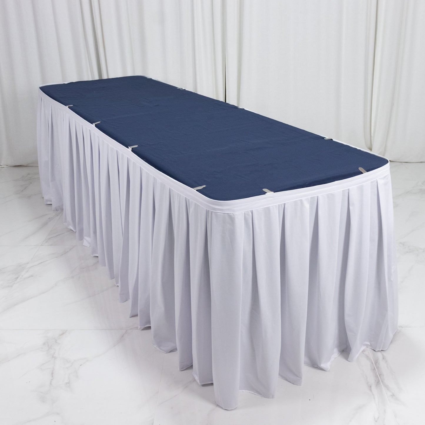 White scuba table skirt with shirred pleat, wrinkle-free and stain-resistant.