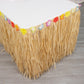 Natural raffia grass table skirt for luau party decorations.
