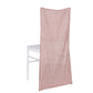 Rose gold shimmer tinsel spandex stretch chair slipcover on a white chair.