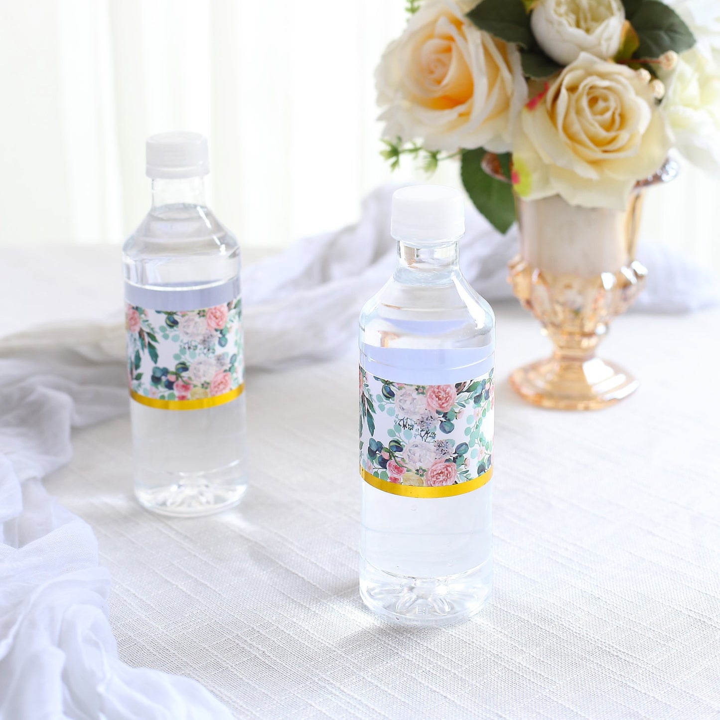 White and pink floral water bottle labels with gold trim.