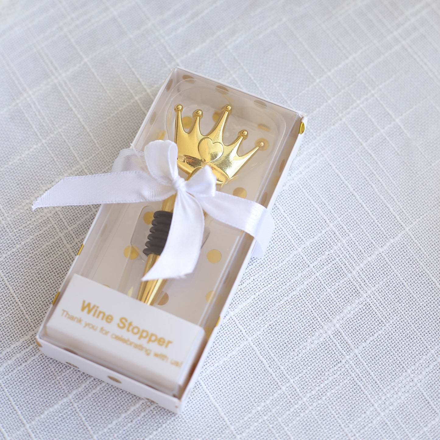 Gold princess crown wine bottle stopper in clear gift box with ribbon.