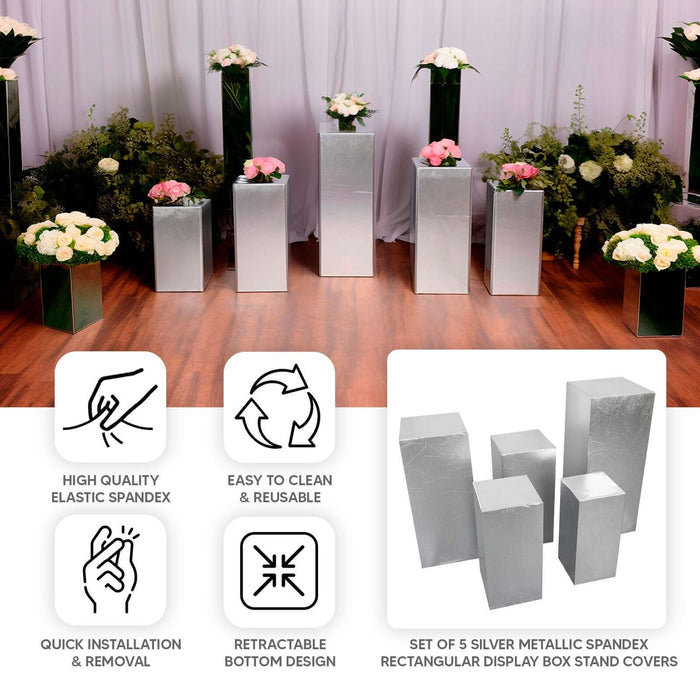 Set of 5 metallic silver spandex pedestal stand covers for events.