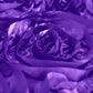 Purple satin round tablecloth with a grandiose rosette design.