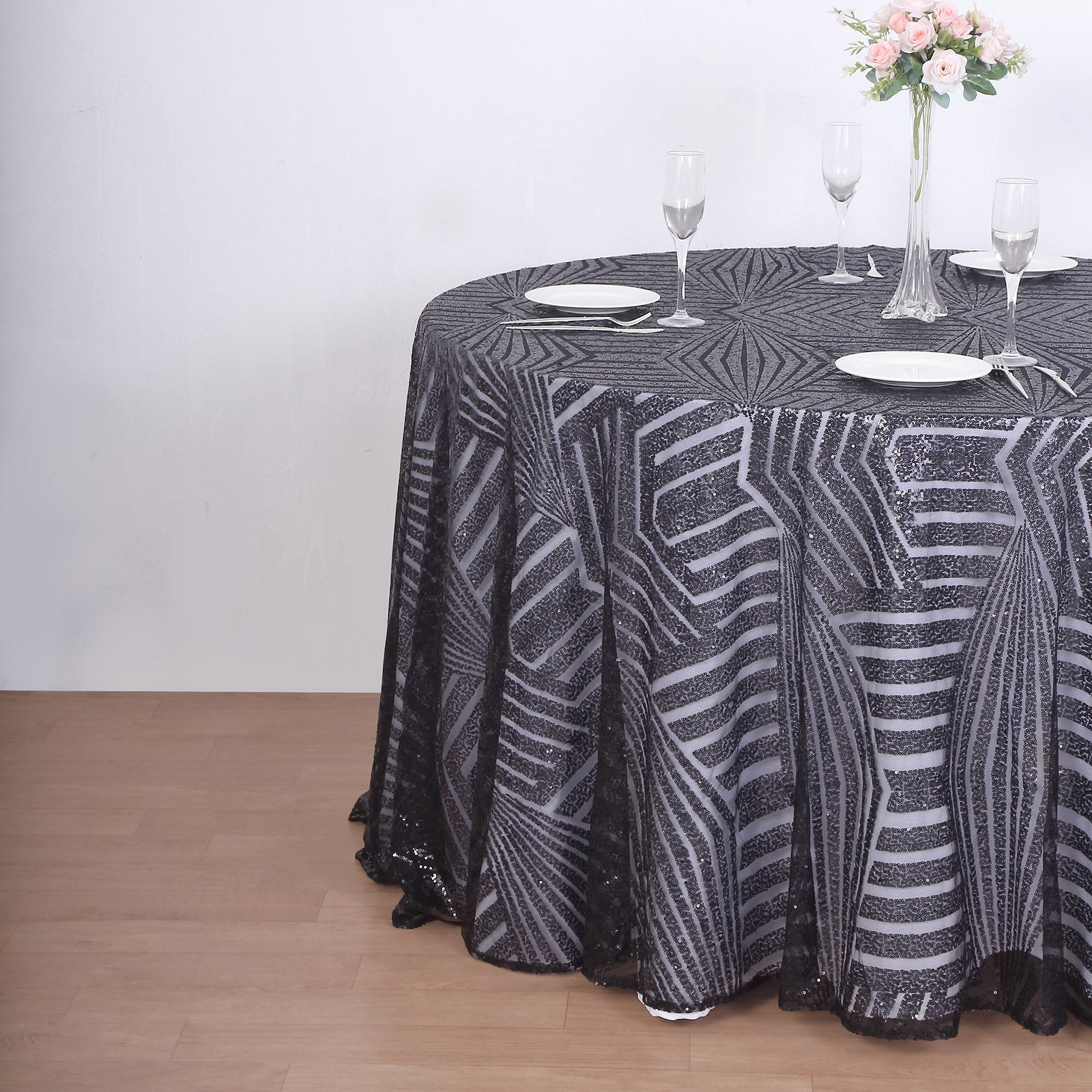 Black sequin round tablecloth with diamond glitz design.